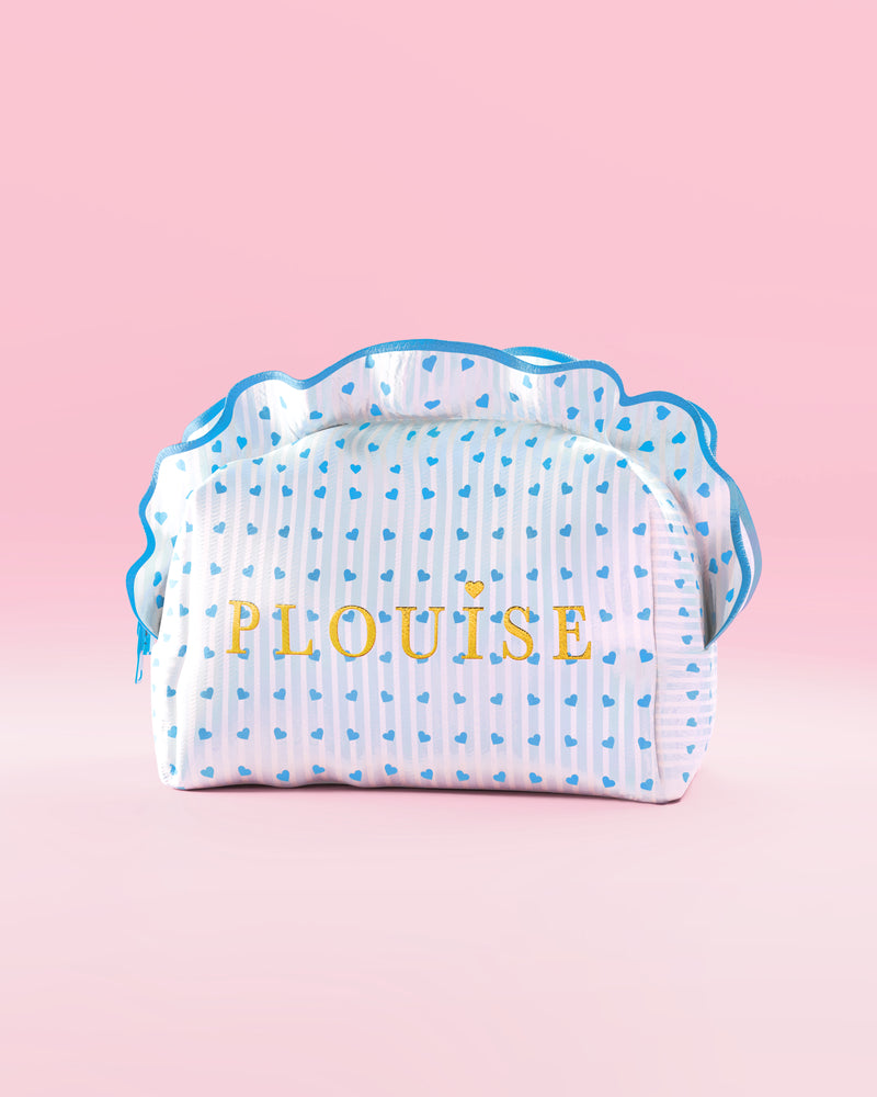 Trousse de maquillage et de soin P.Louise à rayures bleues et blanches avec volants et motif framboise bleu