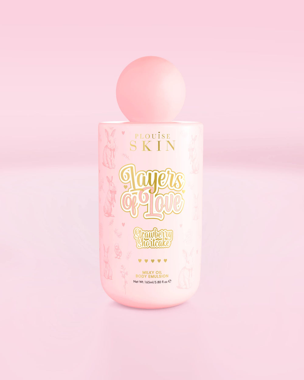 Bouteille rose d'émulsion corporelle à l'huile lactée Layers Of Love de P.Louise au parfum de shortcake aux fraises