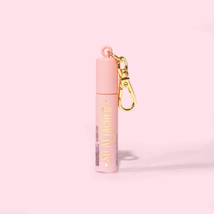 Image du mascara indéchirable mini porte-clés P.Louise dans un tube rose avec écriture dorée et attache porte-clés dorée