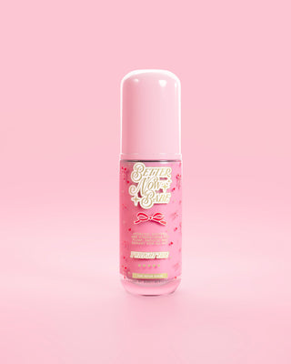 See through pink bottle of P.Louise Better Now Babe pink barrier repair serum in twilight tide scent against a pink background