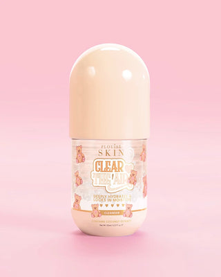 A bottle of the P.Louise Clear The Air Gel Cleanser in coconut cake scent against a pink background