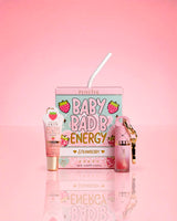 P.Louise Strawberry Baby Bad B Mini Lip Oil & Mini Lip COnditioner on a pink background