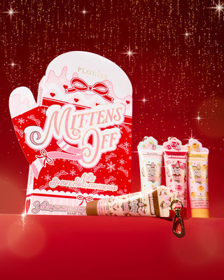 P.Louise Mittens Off Nice List hand cream gift set on a red background with star-like lights