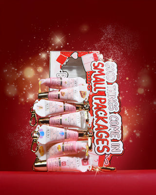 Set of 'All Good Things Come In Small Packages' mini lip conditioner gift set on a red background