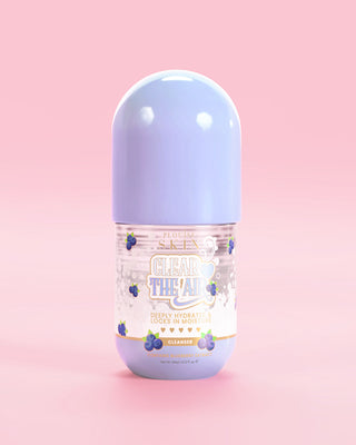 Bottle of P. Louise Clear The Air Blueberry Gel Cleanser on a pink background