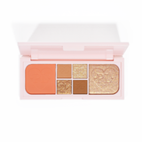 Une image de la mini palette yeux et visage Fluffy Fantasy de P.Louise, composée de mats crémeux et de reflets beurrés dans une gamme de nuances pêche et neutres.